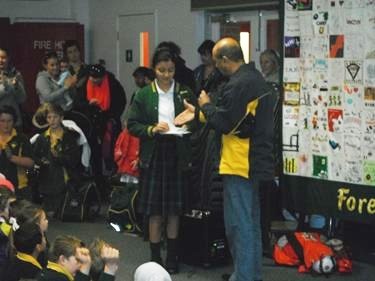 Rotary Representative handing over cheque